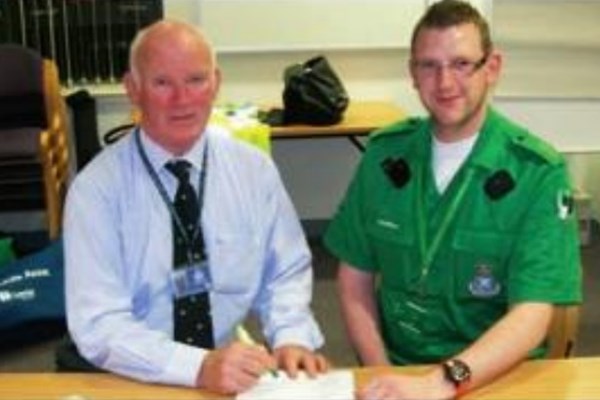 St John Scotland volunteer Bill Spence, and Murray McEwan from the Scottish Ambulance Service, make arrangements for the first Community First Responders scheme, 2012